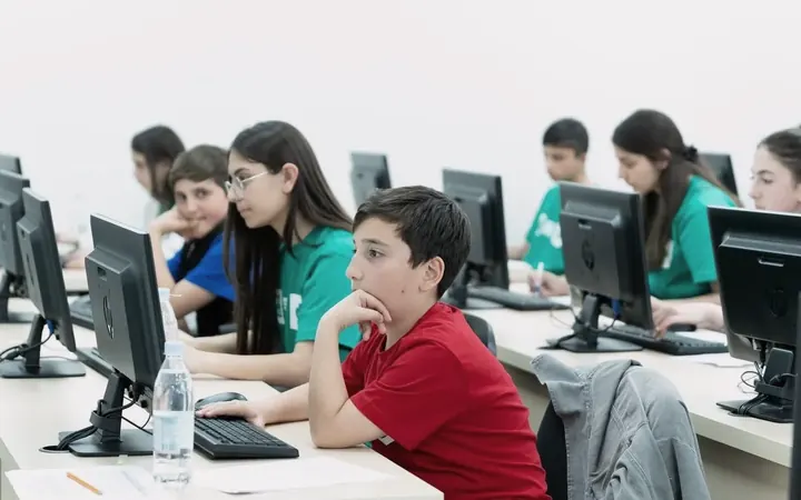 DigiCode participants working at computers